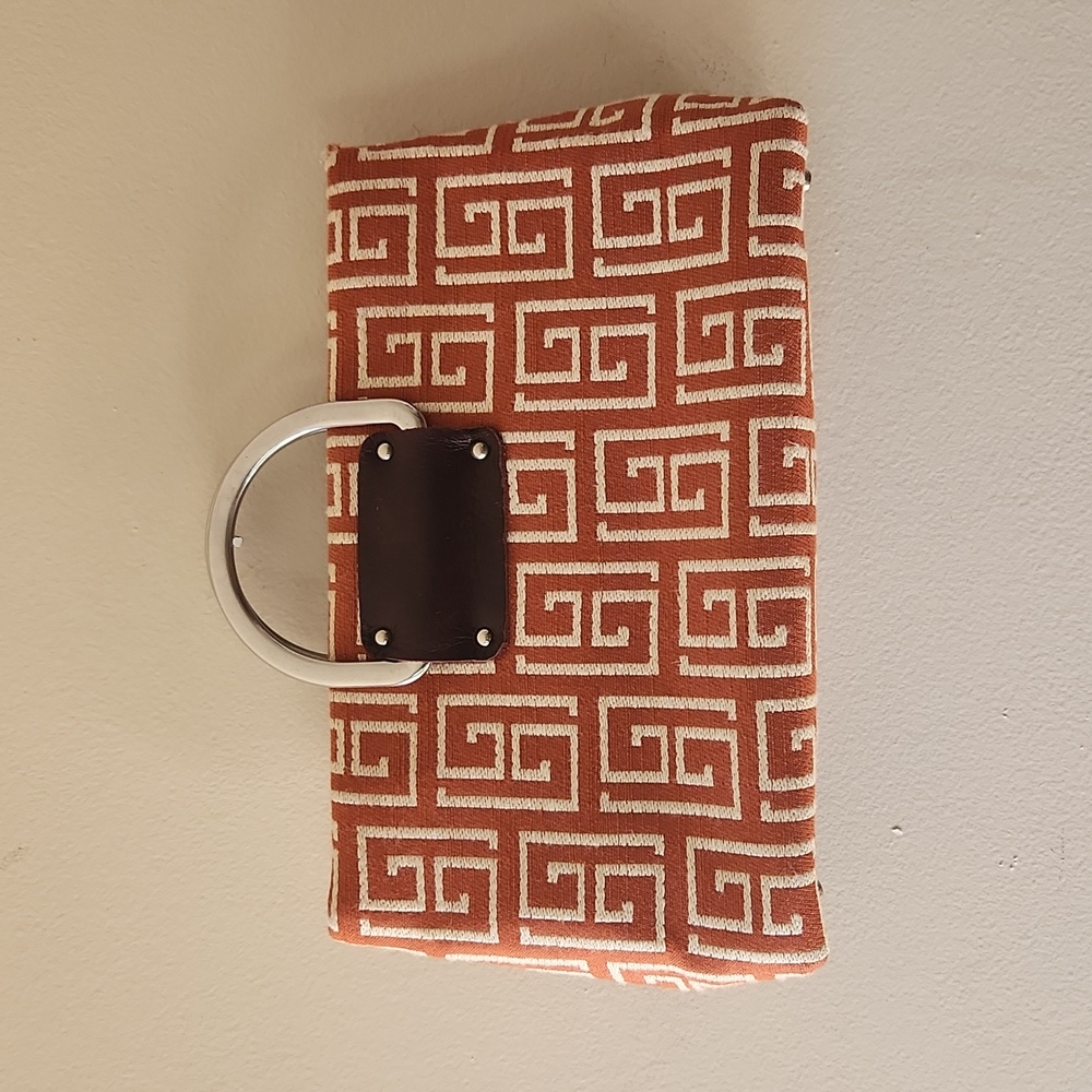 Add libb designs Bilbao orange geometric clutch handbag